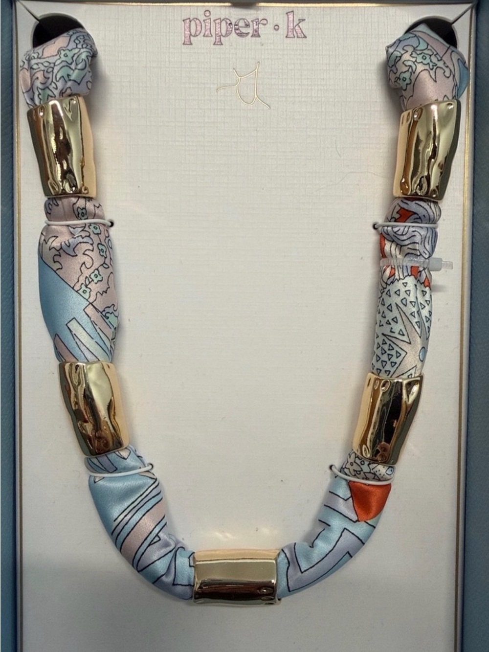 Piper K Pastel Blue and Gold Printed Silk Tube Necklace